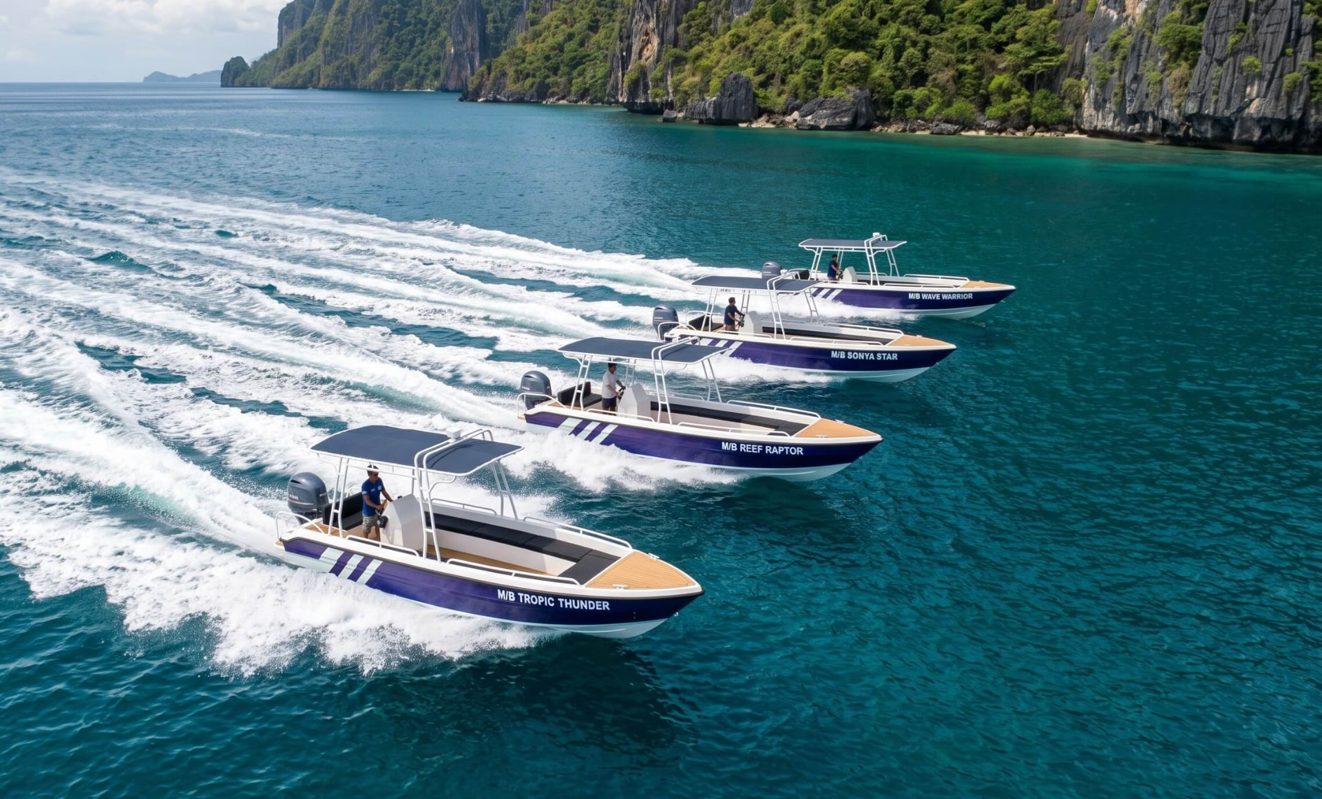All four sister speedboats — M/B Tropic Thunder, Reef Raptor, Sonya Star and Wave Warrior — cruising in formation across turquoise water